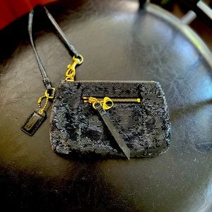 Mini Coach Wristlet. Adorable! Like new! No signs of wear.